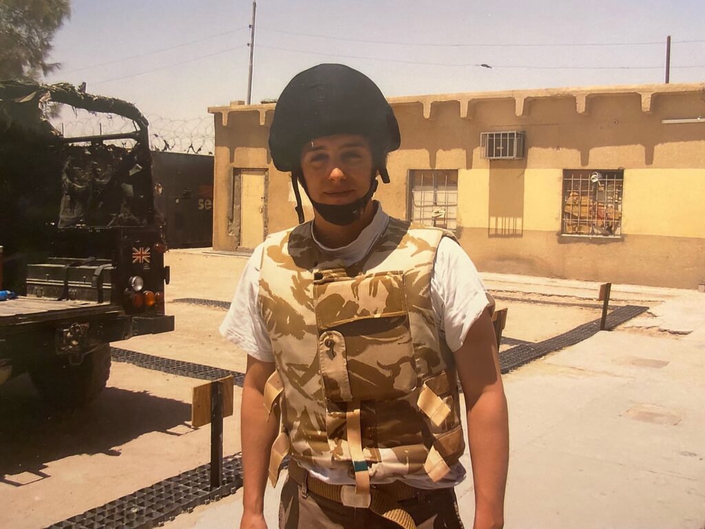 Smpl's Michael Millar when he was a journalist, in body armour and helmet