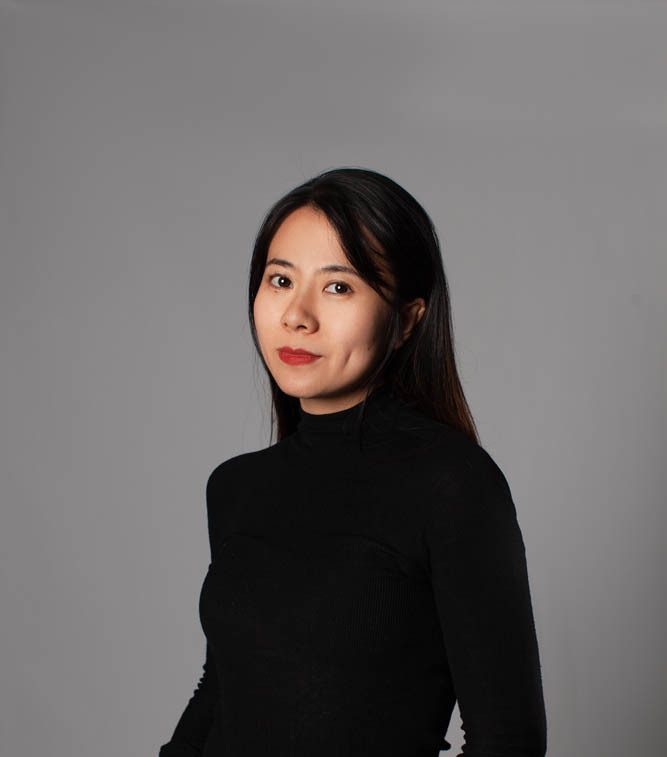 Smpl UX expert Jingjing standing with hands in pockets (colour)